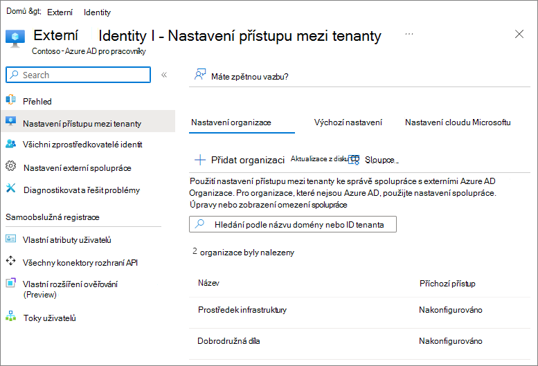 Snímek obrazovky s nastavením přístupu mezi tenanty v ID Microsoft Entra s nakonfigurovanými dvěma externími organizacemi