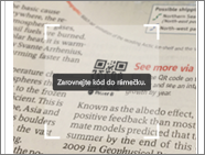 Screenshot of a news print, showing the scanner pointing to a Power BI QR code.