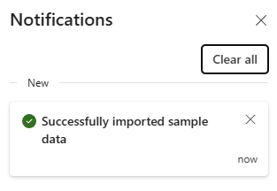 Skærmbillede, der viser, at import af eksempeldata er fuldført.