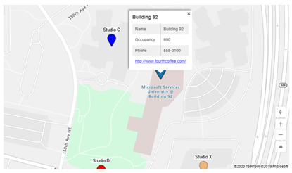 Et skærmbillede af en kortnål, der er valgt i en lærredapp, med et infokort, der viser dataene for Navn, Beskæftigelse og Telefon.