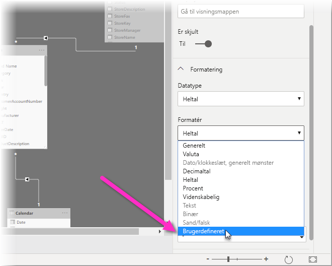 Skærmbillede af Power BI Desktop i udformningsvisning, hvor Brugerdefineret fremhæves i rullemenuen Format.