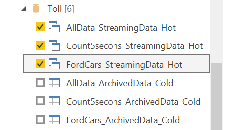 Skærmbillede, der viser hot output-tabeller, der er valgt til streaming af dataflow i Power BI Desktop.