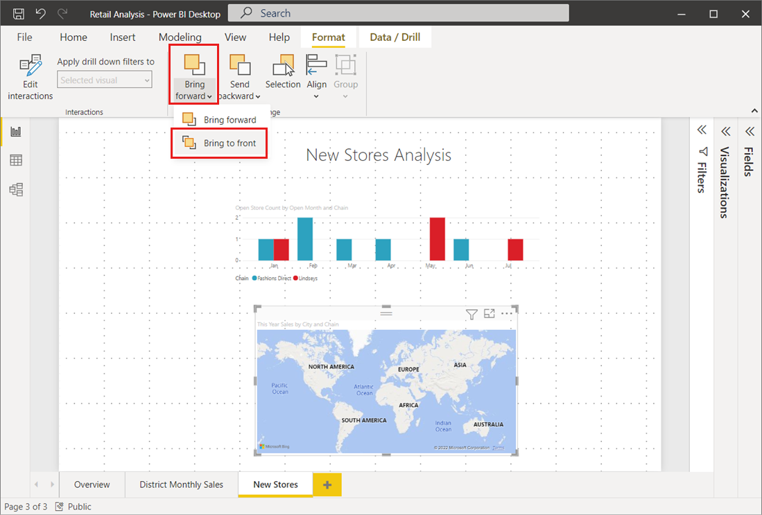 Screenshot: Power BI Desktop-Canvas mit dem Menü „Eine Ebene nach vorne“ und der ausgewählten Option „In den Vordergrund“.