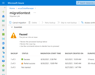 Screenshot des Migrationsauftragsblatts mit einem großen Statussymbol im oberen Bereich im Zustand „Angehalten“.