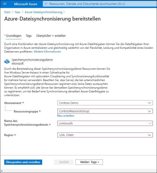 A screenshot the Deploy Azure File Sync page in the Azure portal. The Resource group name is ContosoResourceGroup, the Storage Sync Service name is contosoafs, and the region is EastUS.