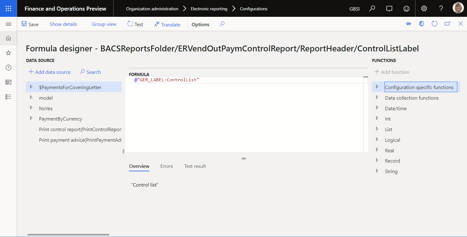 Configuring an ER expression containing a reference to an ER label in the ER formula designer.