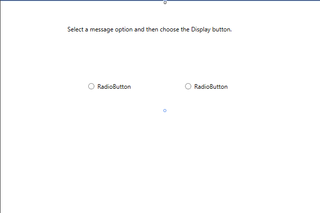 Screenshot of the Design window for Greetings.xaml with a TextBlock and two RadioButton controls on the design surface.