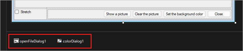 Screenshot shows the Dialog components at the bottom of the designer.