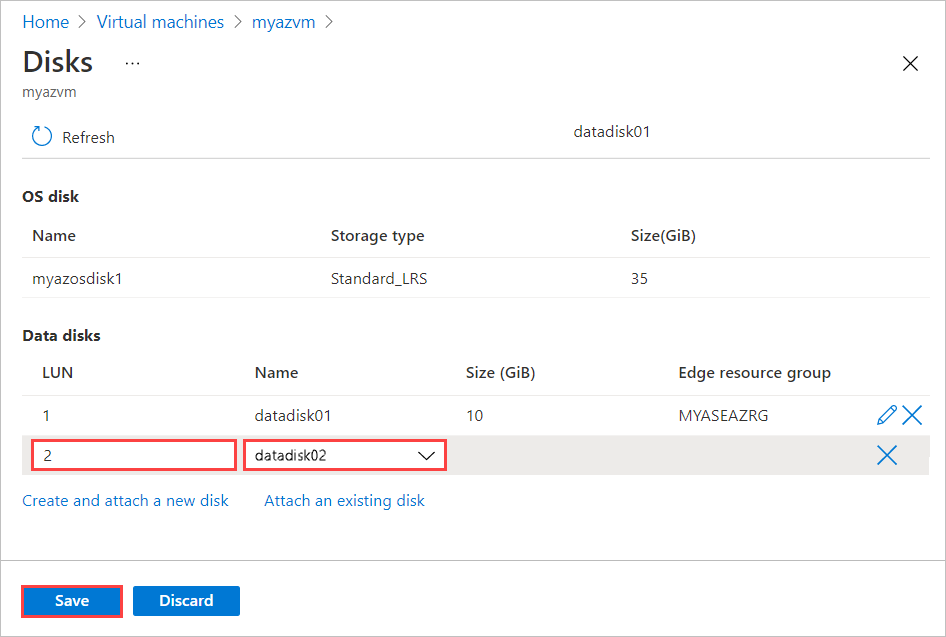 Screenshot of the Disks blade for an Azure Stack Edge virtual machine after an existing disk is added. The LUN number and name of the disk are highlighted, as is the Save button.