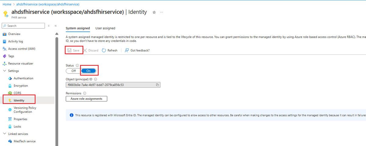 Screenshot that shows selections for enabling a managed identity for the FHIR service.