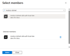 A screenshot showing how to filter for and select the Microsoft Entra group for the app in the Select members dialog box.