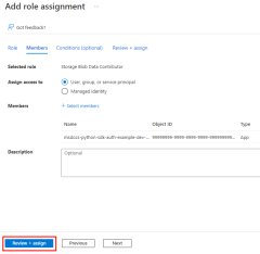 A screenshot showing the completed Add role assignment page and the location of the Review + assign button used to complete the process.