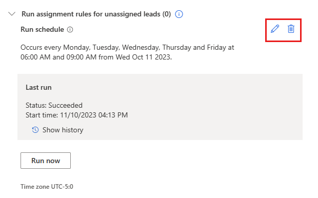 Screenshot of the Run assignment rules pane, with a run scheduled and the edit and delete icons highlighted.