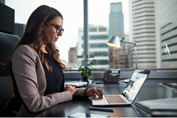 Image of a generic business person using a computer.