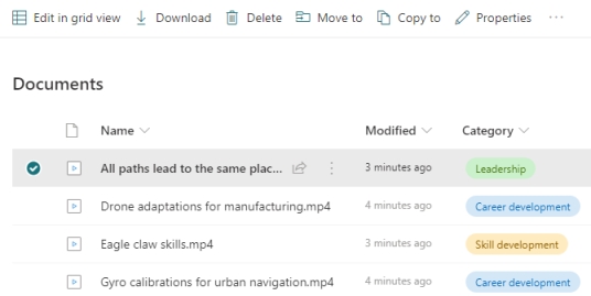 A list of videos in a document library each with a custom column called "Category" filled out with values of "Leadership", "Career development", and "Skill development".