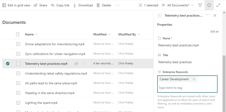 List of files in a document library, with the details pane open for one of the files, and the Enterprise Keywords field filled out with a keyword of "Career Development"