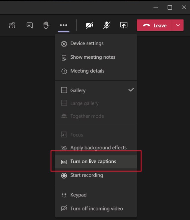 Screenshot showing Teams message menu with turn on live captions highlighted.