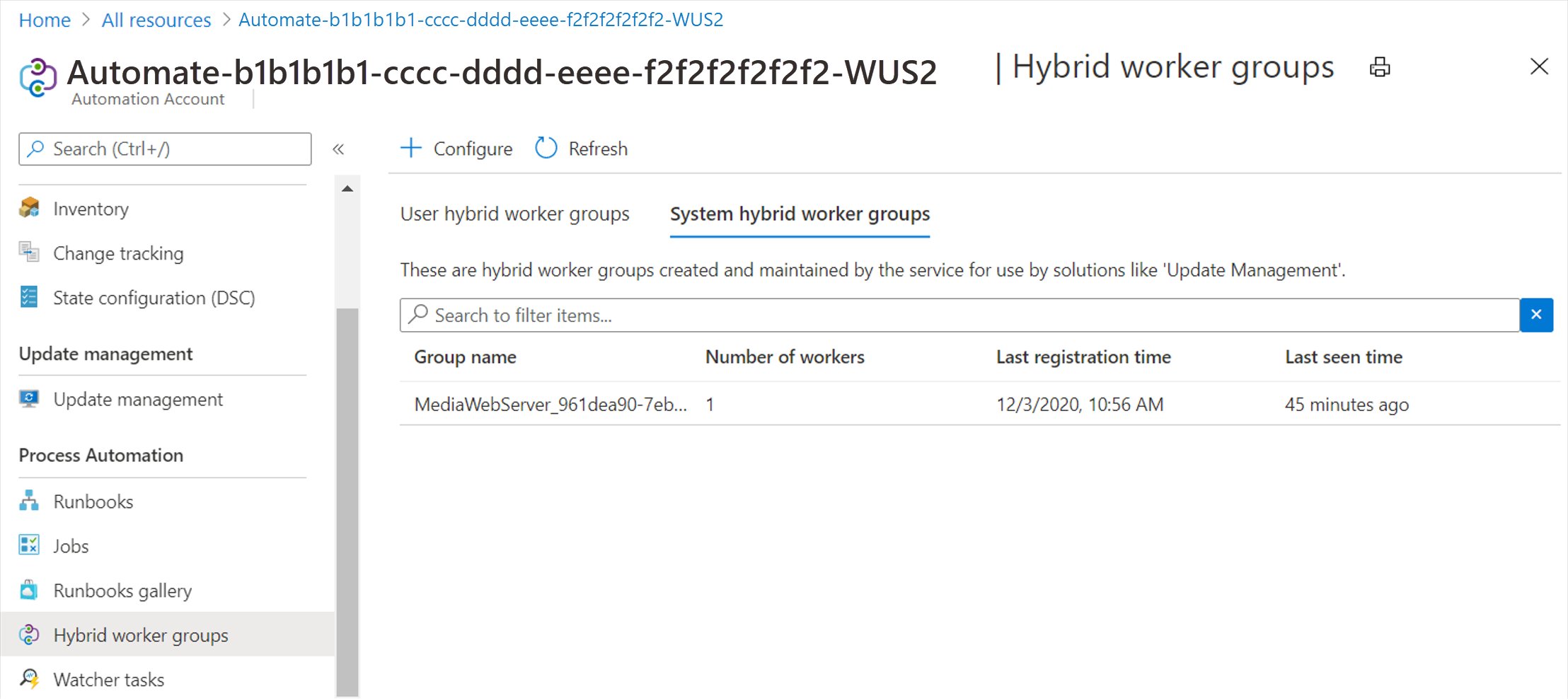 Screenshot that shows the VM as a system hybrid worker group for the Automation account.