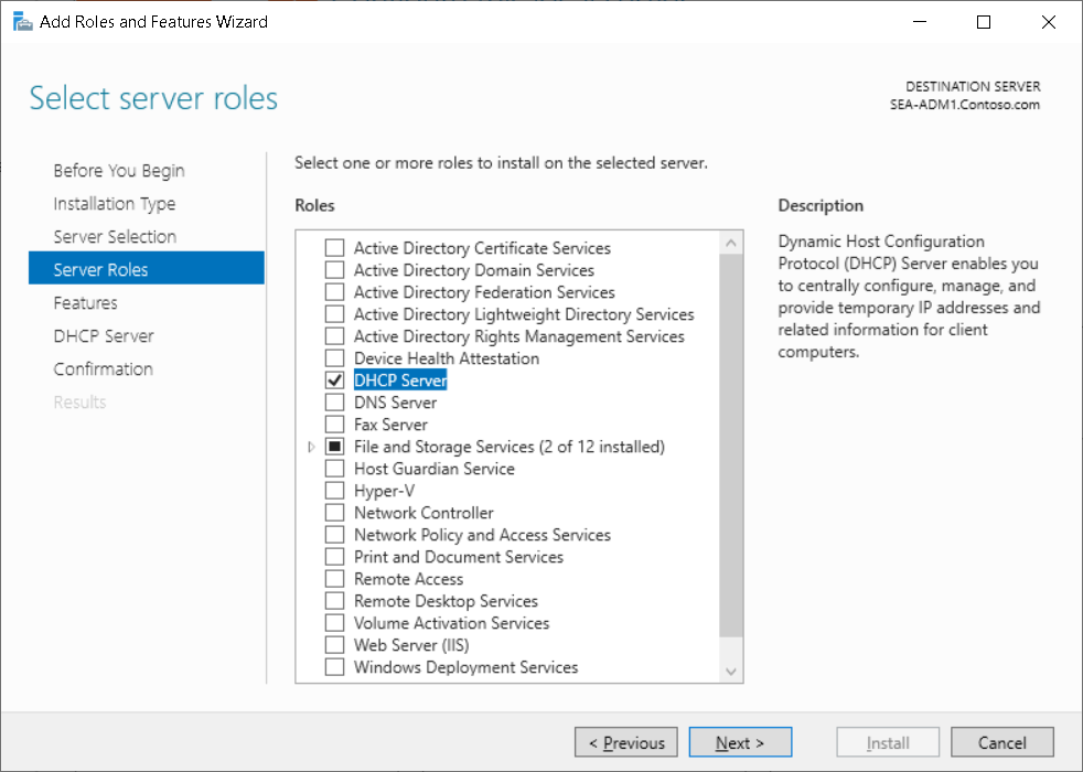 A screenshot of the Add Roles and Features Wizard in Server Manager. On the Select server roles page, the administrator has selected DHCP Server.