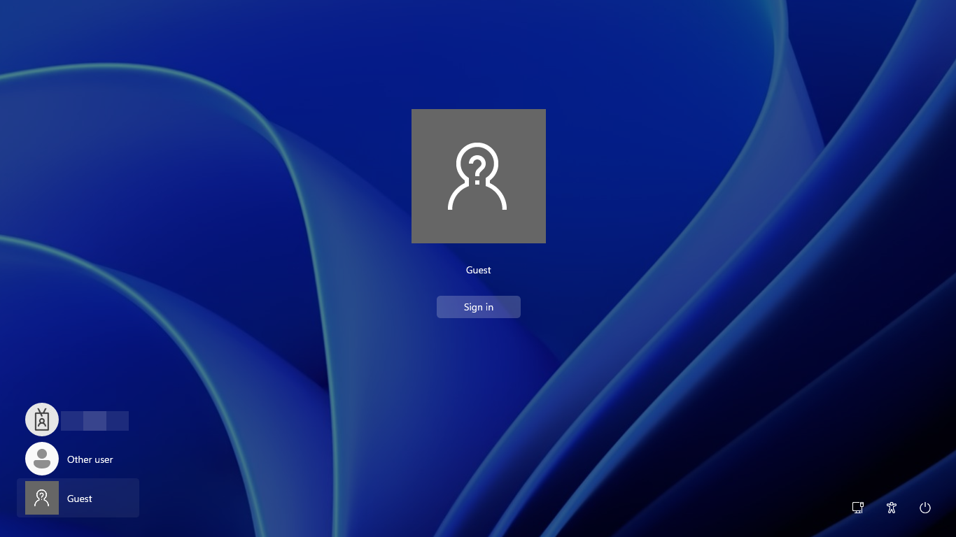 Windows 11 sign-in screen with Guest option enabled.