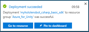 Screenshot that shows deployment succeeded and the 'Go to resources' button.