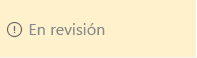 Cuadro amarillo con el texto En revisión y un icono de peligro