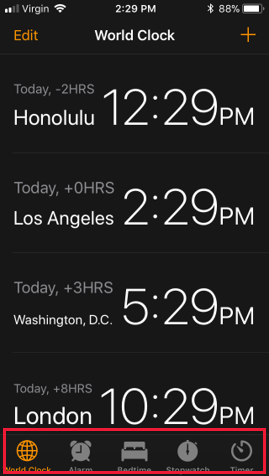 Captura de pantalla de la aplicación iOS Clock en la que se muestra la barra de pestañas inferior con varias pestañas relacionadas con la hora: Reloj internacional, Alarma, Hora de dormir, Cronómetro y Temporizador.