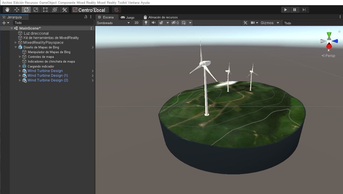 Captura de pantalla de la ventana de jerarquía de Unity con la escena principal seleccionada y varios elementos Prefab de turbina colocados sobre el terreno dinámico.
