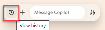 Recorte de pantalla de la barra de búsqueda de Copilot con el icono Ver historial resaltado.