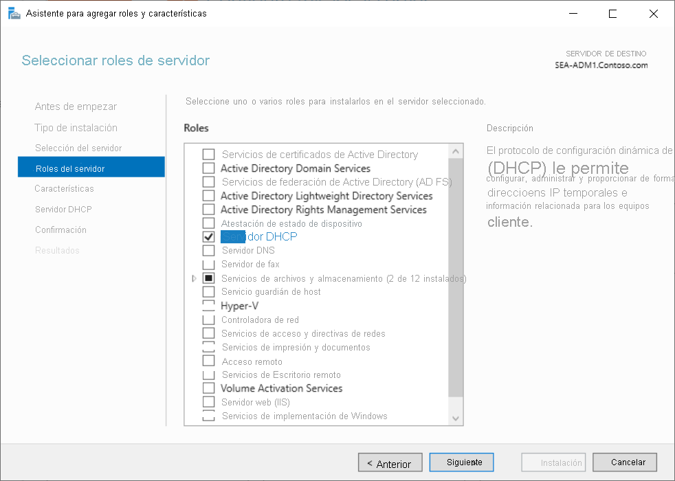 A screenshot of the Add Roles and Features Wizard in Server Manager. On the Select server roles page, the administrator has selected DHCP Server.