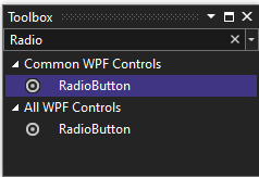 Captura de pantalla de la ventana Cuadro de herramientas con el control RadioButton seleccionado en la lista de controles comunes de WPF.