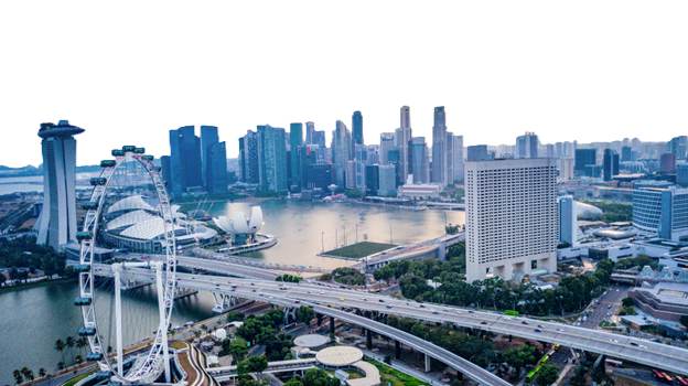 Photo of a city near water; sky is transparent.