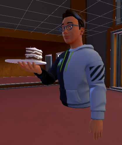 Screen shot of an avatar holding the Birthday Cake.