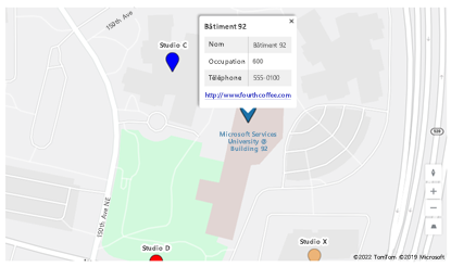 Une capture d’écran d’une épingle de carte sélectionnée dans une application canevas, avec une carte d’informations indiquant le nom de l’emplacement, l’occupation et les données du téléphone.