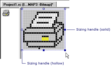 Poignées de dimensionnement d'une image bitmap