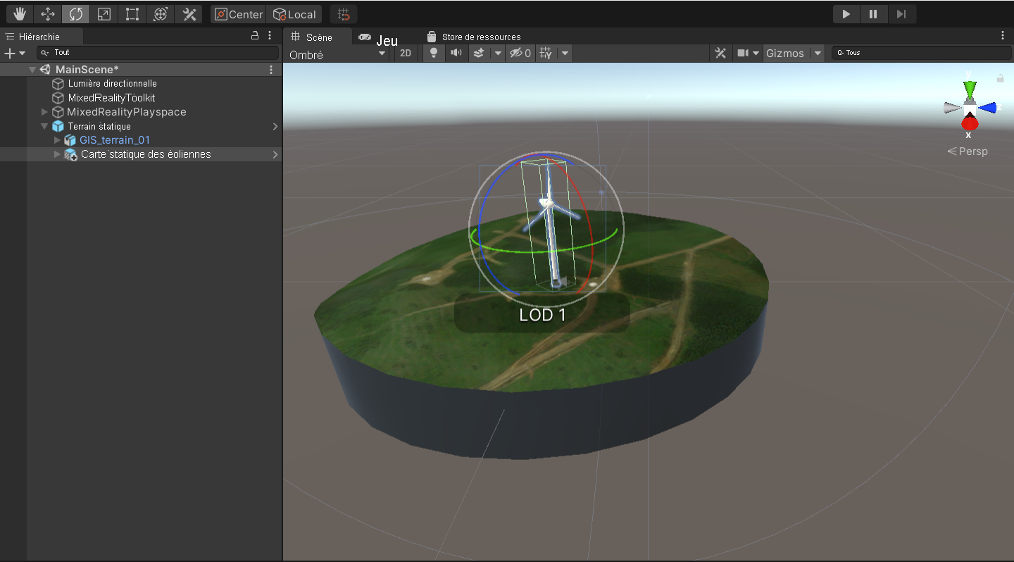 Capture d’écran de la fenêtre de scène Unity avec la scène principale en cours d’exécution, l’objet enfant Wind Turbine Static Map et l’outil de mise à l’échelle en surbrillance.