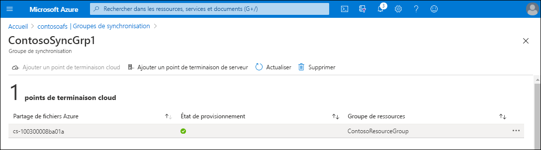 Capture d’écran de la page ContosoSyncGrp1 dans le portail Azure. Un point de terminaison cloud liste le nom du partage de fichiers Azure et le groupe de ressources.