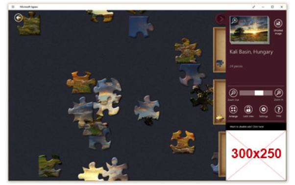 Screenshot of Game Play and Game Completion Screens in Microsoft Jigsaw.