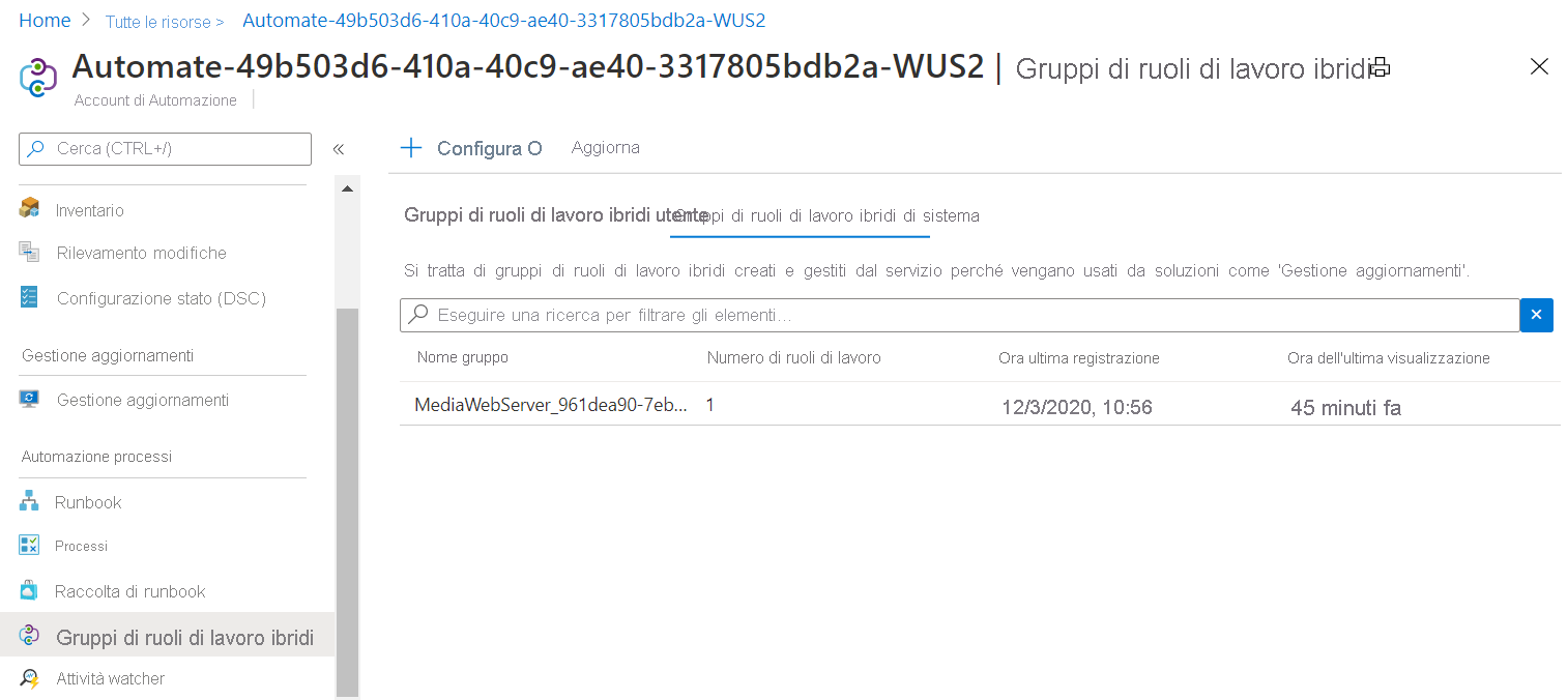 Screenshot che mostra la macchina virtuale come gruppo di lavoro ibrido di sistema per l'account di Automazione.