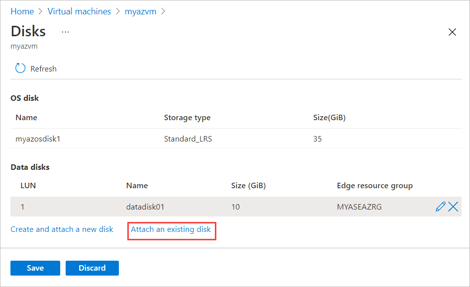 Azure Stack Edge 仮想マシンの [ディスク] ブレードのスクリーンショット。[既存のディスクの接続] オプションが強調表示されています。