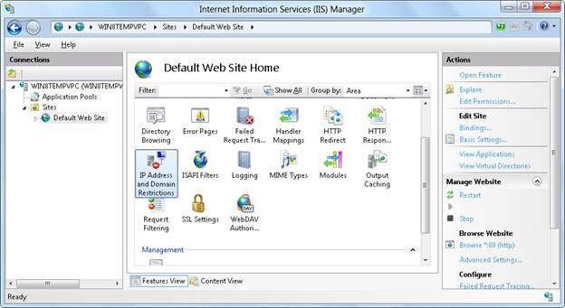 I I S マネージャーを示すスクリーンショット。[既定の Web サイト ホーム] ウィンドウで [I P アドレスとドメインの制限] が選択されています。