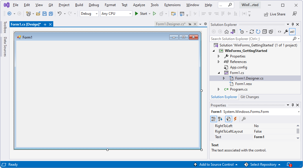 Visual Studio ウィンドウ。ベースライン WinForms プロジェクトとフォーム Designer