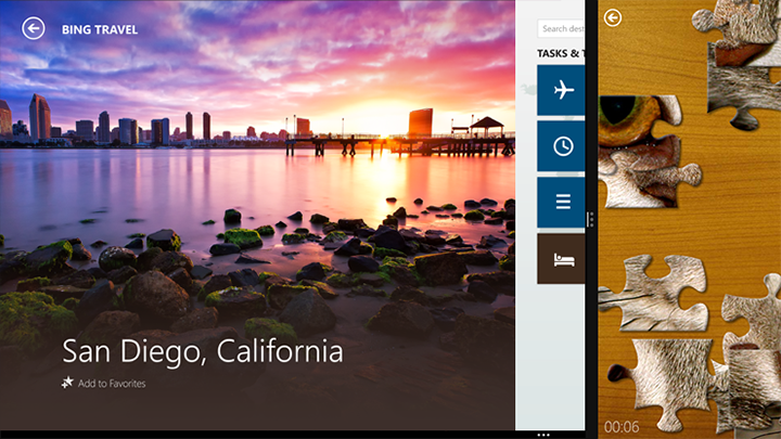 PuzzleTouch アプリは狭い幅にサイズ変更されてズーム状態で表示され、Bing Travel アプリと画面を共有している