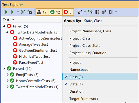 Screenshot of the Visual Studio Test Explorer showing a test hierarchy in one pane and the Group By menu in the other with the Class and State options checked.