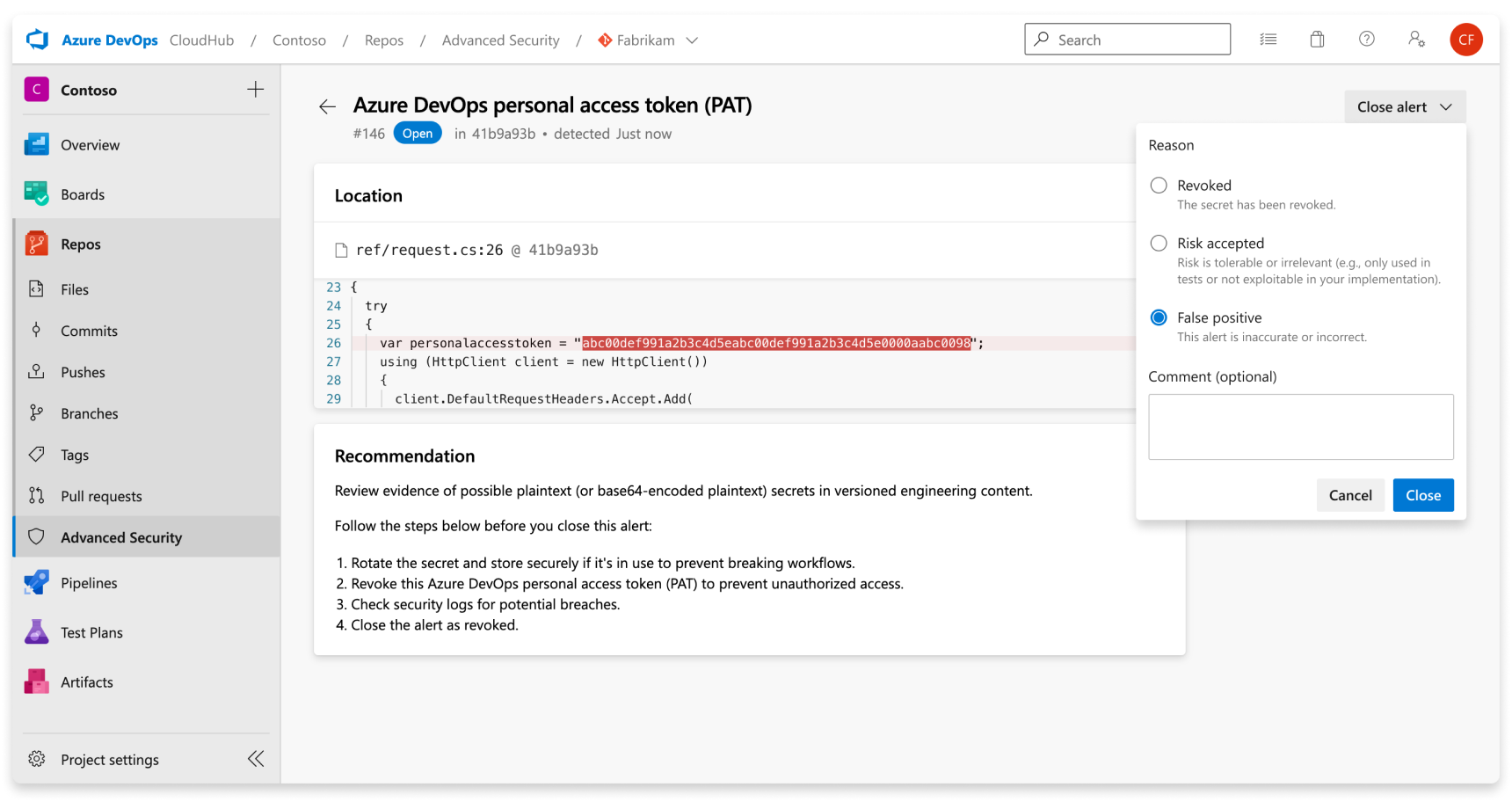 Screenshot showing dismissal details for a secret scanning alert