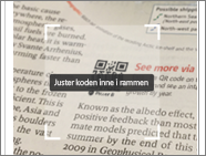 Screenshot of a news print, showing the scanner pointing to a Power BI QR code.