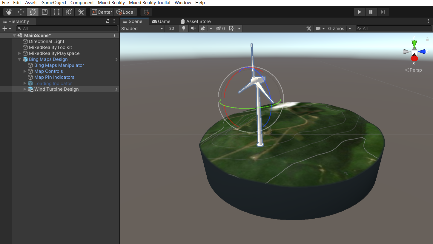 Schermopname van het unity-hiërarchievenster met de hoofdscène geselecteerd en het onderliggende object van het windturbineontwerp uitgevouwen. Het hulpmiddel Draaien is ook geselecteerd.