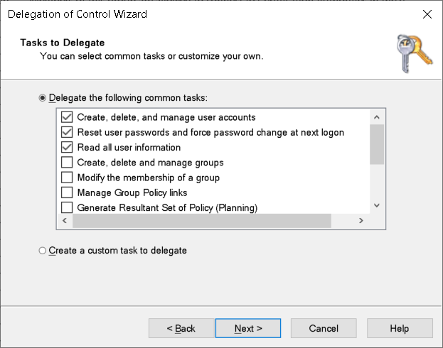 Een schermopname van de pagina Taken om te delegeren in de wizard Delegering van het besturingselement. De beheerder heeft de taken geselecteerd die betrekking hebben op gebruikersbeheer.