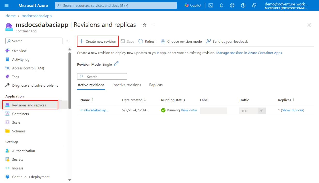 Screenshot of the 'Create new revision' option in the command bar of the Azure portal.