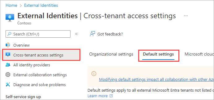 Captura de tela mostrando a seção de restrições de locatário na guia configurações padrão.